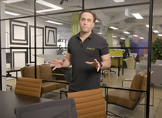 Jason on our boardroom chair range