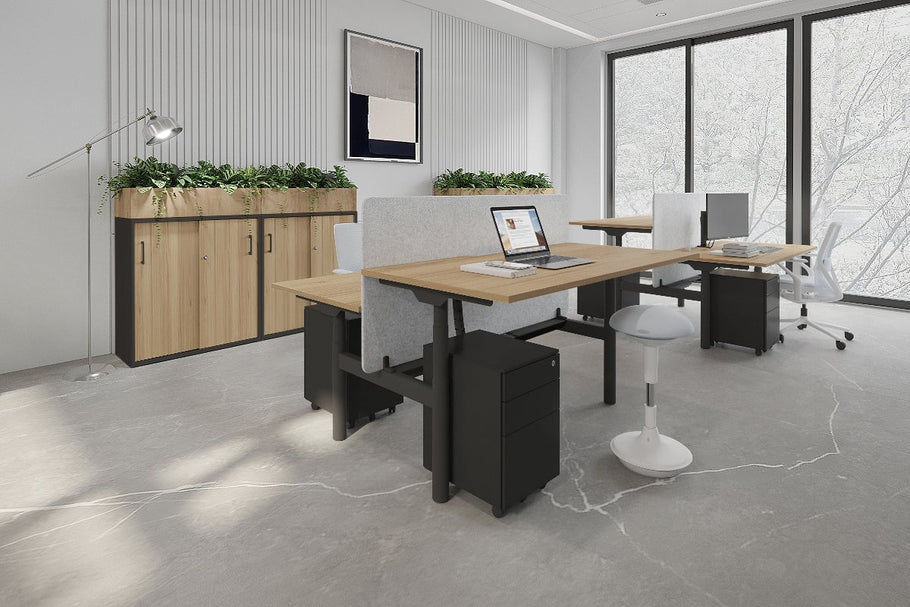 Environmental image of Flexi Premium Height Adjustable 2 Person H-Bench Workstation - Black Frame [1400L x 800W with Cable Scallop]