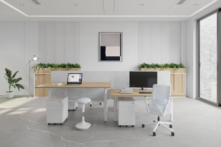 Environmental image of Flexi Premium Height Adjustable 4 Person H-Bench Workstation - White Frame [1400L x 800W with Cable Scallop]